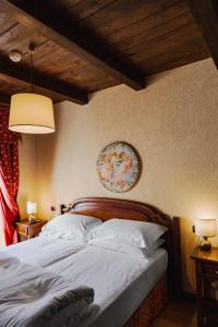 Postel nebo postele na pokoji v ubytování Hotel Jumeaux