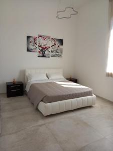 Posteľ alebo postele v izbe v ubytovaní Villa Di Giulio Suite