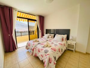 Postel nebo postele na pokoji v ubytování Royal Holiday Home