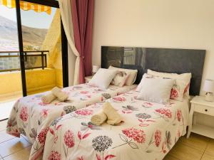Postel nebo postele na pokoji v ubytování Royal Holiday Home