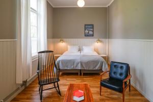 Postel nebo postele na pokoji v ubytování Nordic Refuge B&B
