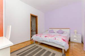 Postel nebo postele na pokoji v ubytování Apartments Drazen