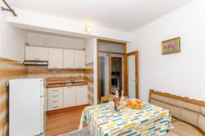 Kuchyň nebo kuchyňský kout v ubytování Apartments Drazen