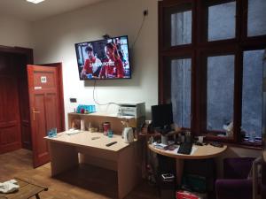 Televiisor ja/või meelelahutuskeskus majutusasutuses Cozy place 1
