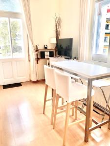 Televízia a/alebo spoločenská miestnosť v ubytovaní Executive Apartement Gastein