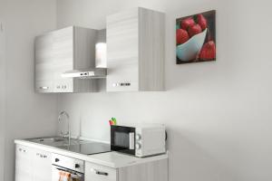 Kuchyň nebo kuchyňský kout v ubytování Pula Residence - Via Delle Rose + 39 fotografií
