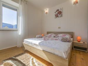 Postel nebo postele na pokoji v ubytování Villa Odiseja + 37 fotografií