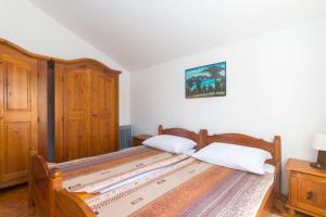 Postel nebo postele na pokoji v ubytování Apartment Krekovic