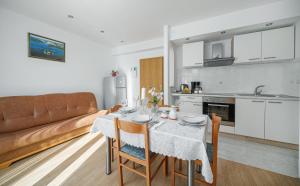 Kuchyň nebo kuchyňský kout v ubytování Apartments Tamaris