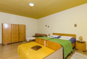 Posteľ alebo postele v izbe v ubytovaní Apartments Franciska