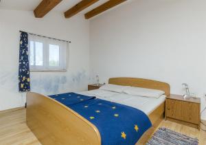 Posteľ alebo postele v izbe v ubytovaní Apartments Franciska
