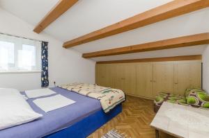 Posteľ alebo postele v izbe v ubytovaní Apartments Franciska