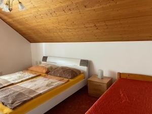 Posteľ alebo postele v izbe v ubytovaní Jasmin Apartman + 1 fotografia