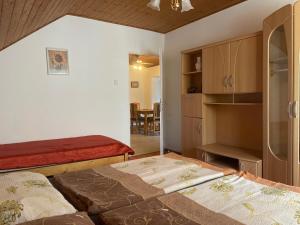 Posteľ alebo postele v izbe v ubytovaní Jasmin Apartman