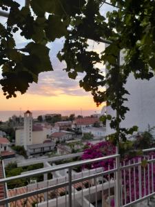 The sunrise or sunset as seen from a panziókat or nearby