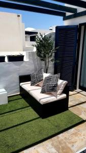 Posezení v ubytování Casa Mykonos 1° linea de mar en Playa Blanca
