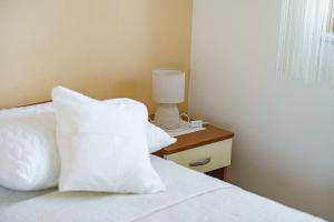 Postel nebo postele na pokoji v ubytování Apartments Zinfandel Vodice