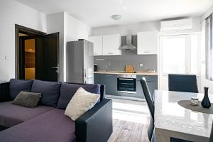 Kuchyň nebo kuchyňský kout v ubytování Apartments Zinfandel Vodice