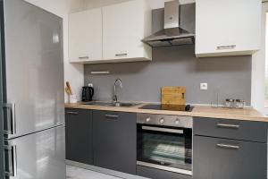 Kuchyň nebo kuchyňský kout v ubytování Apartments Zinfandel Vodice