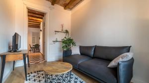 Televízia a/alebo spoločenská miestnosť v ubytovaní 21PER1020 - Cozy apartment in Vila de Gracia