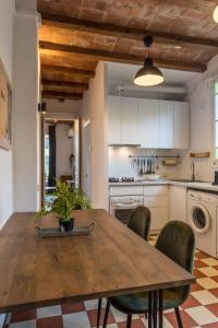Kuchyňa alebo kuchynka v ubytovaní 21PER1020 - Cozy apartment in Vila de Gracia