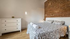 Posteľ alebo postele v izbe v ubytovaní 21PER1020 - Cozy apartment in Vila de Gracia