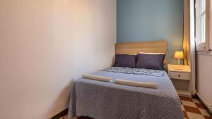 Posteľ alebo postele v izbe v ubytovaní 21PER1020 - Cozy apartment in Vila de Gracia