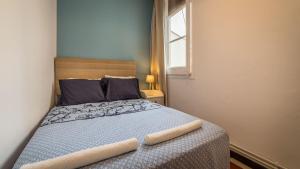Posteľ alebo postele v izbe v ubytovaní 21PER1020 - Cozy apartment in Vila de Gracia
