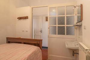 A bed or beds in a room at Rivierarent Casa Iolanda