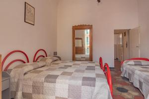 A bed or beds in a room at Rivierarent Casa Iolanda
