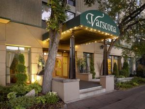 a building with a sign that reads the americano at Varscona Hotel on Whyte in Edmonton