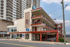 a building on the corner of a street at Rodeway Inn Oceanview in Atlantic City