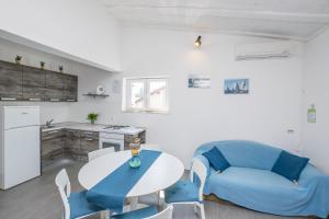 Kuchyň nebo kuchyňský kout v ubytování Apartments Mira