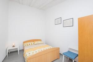 Postel nebo postele na pokoji v ubytování Apartments Mira