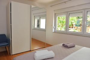 Posteľ alebo postele v izbe v ubytovaní Apartment Botanic
