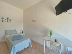 Postel nebo postele na pokoji v ubytování Guest House Service - Modugno