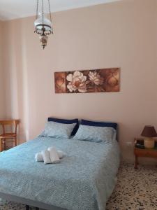 Giường trong phòng chung tại A Due Passi Dal Centro