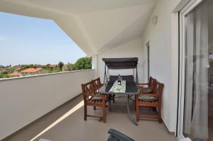 Balkón alebo terasa v ubytovaní Apartments Pool