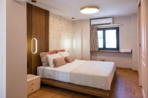 Posteľ alebo postele v izbe v ubytovaní Adell Miramare Golden Loft