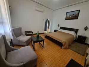 Letto o letti in una camera di Targafit Hotel & Hammam