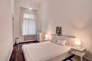 Posteľ alebo postele v izbe v ubytovaní Inn the downtown