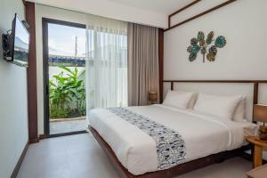 Katil atau katil-katil dalam bilik di Baan Kamana Guest House