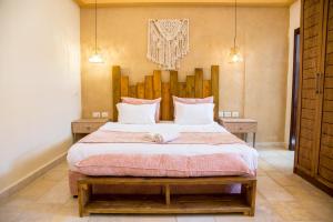 Luna Resort - Mitzpe Ramon tesisinde bir odada yatak veya yataklar