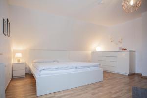 Llit o llits en una habitació de Gemütliches Ferienhaus