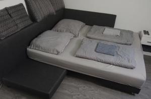 Posteľ alebo postele v izbe v ubytovaní Csigaház Apartman