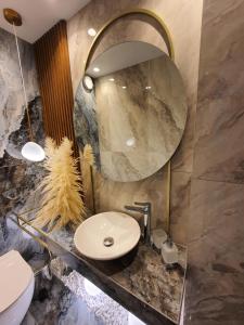 Kúpeľňa v ubytovaní Adell Miramare Golden Loft