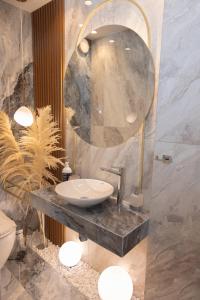 Kúpeľňa v ubytovaní Adell Miramare Golden Loft