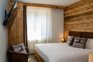 Postel nebo postele na pokoji v ubytování Hotel Da Franco e Adriana