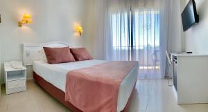 TV a/nebo společenská místnost v ubytování Hotel Aromar