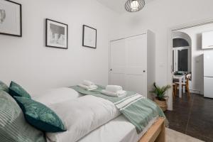 Posteľ alebo postele v izbe v ubytovaní Apartman LaMandra
